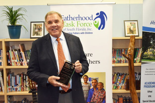 IHL accepting Visionary Award