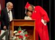 Mr. Leesfield presents the 2026 Dexter Butler College Scholarship to Key West High School Senior James Osborne as he embraces Anita Butler, Dexter's mother